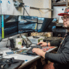 Jimmy Mai at work in the Lawrence Berkeley National Laboratory gaming lab in 2018. (Credit: Berkeley Lab)