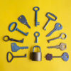 Passwords are a key step to account safety at Berkeley Lab. Stock image of keys and a padlock.