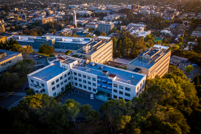 An aerial photograph of Berkeley Lab, looking southwest towards the U.C. Berkeley campus, the Building 50 complex is seen in the foreground. 05/20/2020, Berkeley, California.