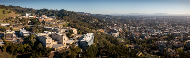 An aerial view of Lawrence Berkeley National Laboratory (Berkeley Lab) showing the construction site for the BioEPIC project (left), the Integrated Genomics Building (IGB, Building 91), The Advanced Light Source (ALS) on the hill behind the IGB, and to the right the Building 50 complex, Buildings 70, and 70A, in Berkeley, California, 02/06/2023. (Credit: Thor Swift/Berkeley Lab)