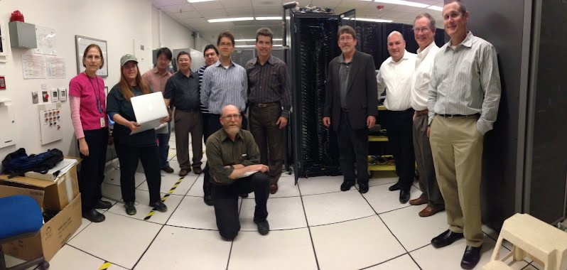 Direct-Chip Cooling project team consisting of staff from EETD, ScienceIT, Asetek, Cisco, and Intel. (Credit: Berkeley Lab)